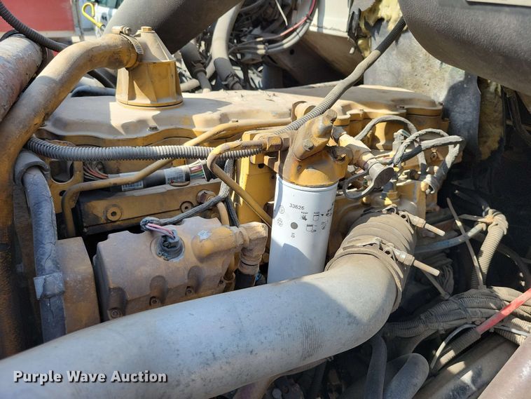 image for item DX7031 2003 Sterling LT8500 grapple crane truck