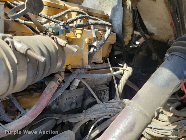 image for item DX7031 2003 Sterling LT8500 grapple crane truck