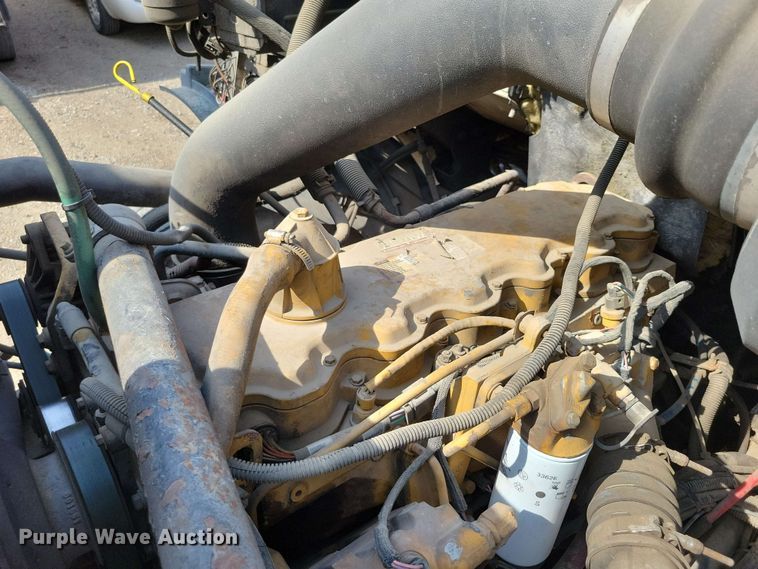 image for item DX7031 2003 Sterling LT8500 grapple crane truck