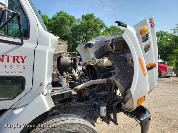 image for item DX7031 2003 Sterling LT8500 grapple crane truck