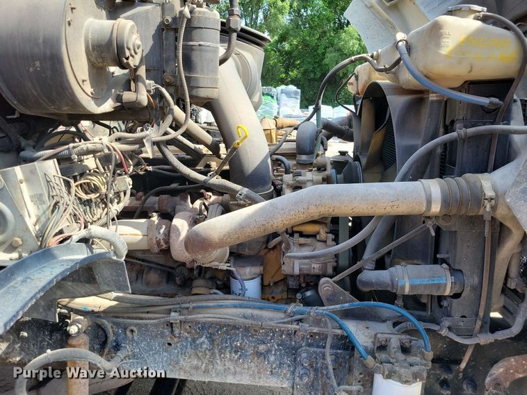 image for item DX7031 2003 Sterling LT8500 grapple crane truck