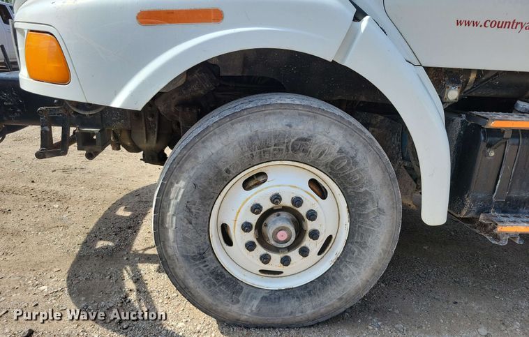 image for item DX7031 2003 Sterling LT8500 grapple crane truck