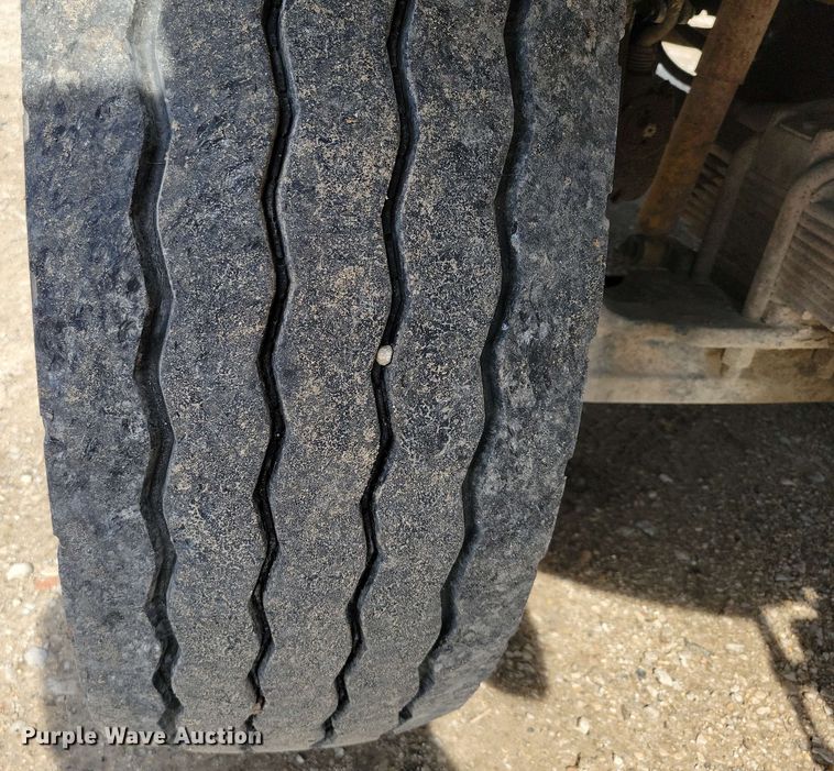 image for item DX7031 2003 Sterling LT8500 grapple crane truck