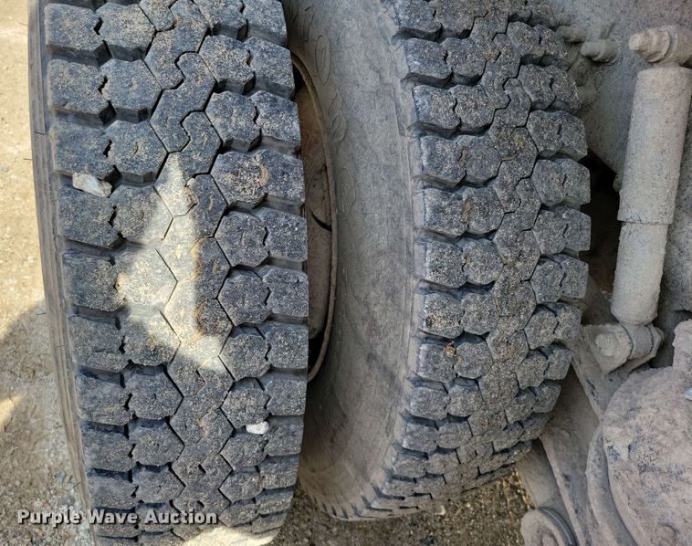 image for item DX7031 2003 Sterling LT8500 grapple crane truck