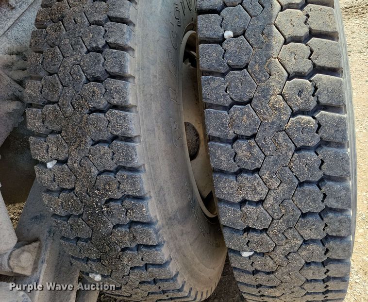 image for item DX7031 2003 Sterling LT8500 grapple crane truck