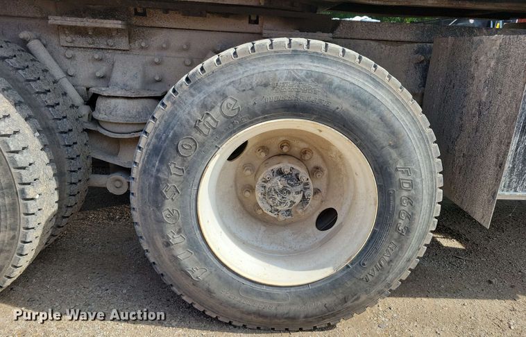 image for item DX7031 2003 Sterling LT8500 grapple crane truck