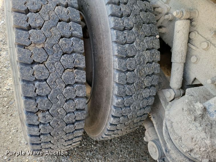 image for item DX7031 2003 Sterling LT8500 grapple crane truck