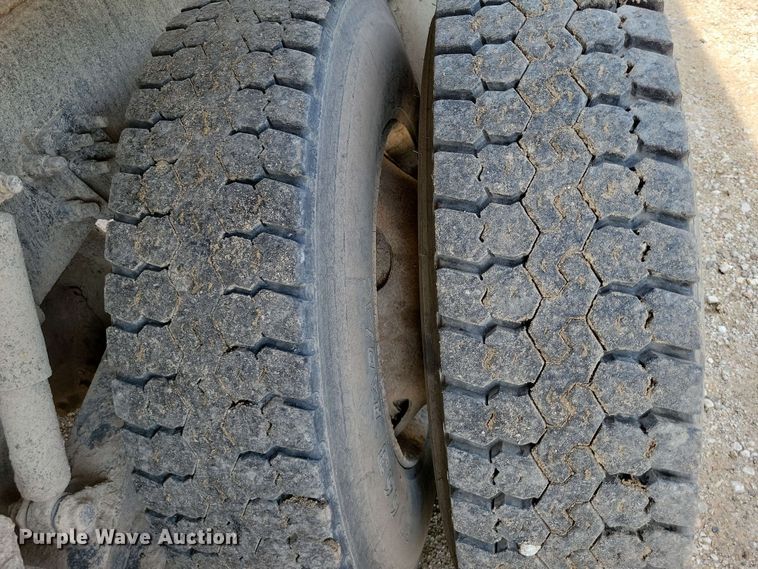 image for item DX7031 2003 Sterling LT8500 grapple crane truck