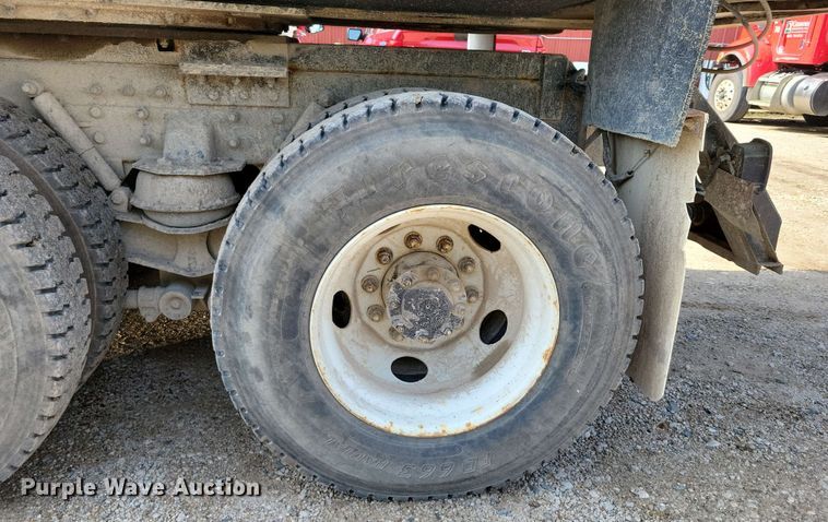 image for item DX7031 2003 Sterling LT8500 grapple crane truck