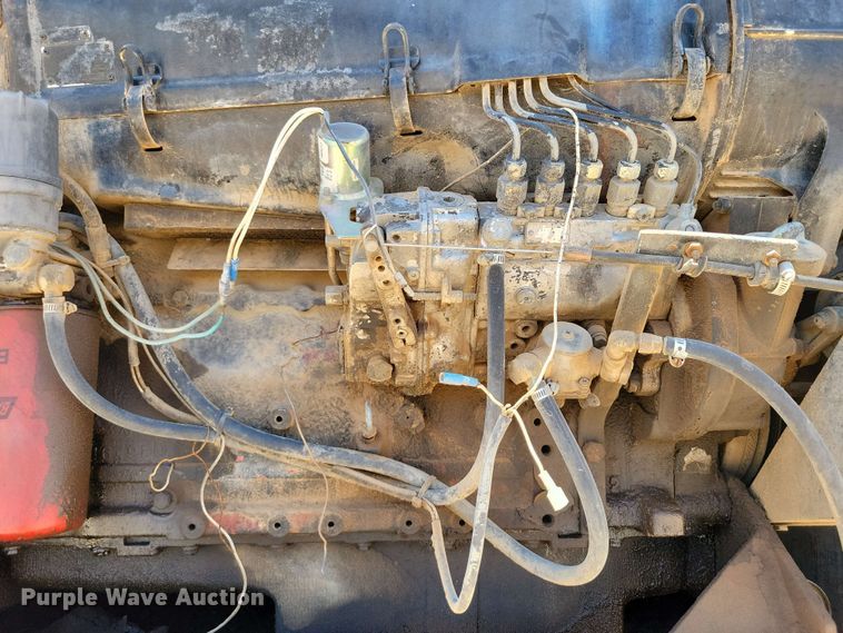 image for item DX7078 2000 Volvo WG Series asphalt slurry truck