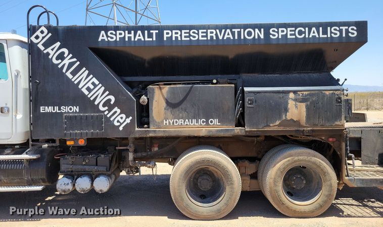 image for item DX7078 2000 Volvo WG Series asphalt slurry truck