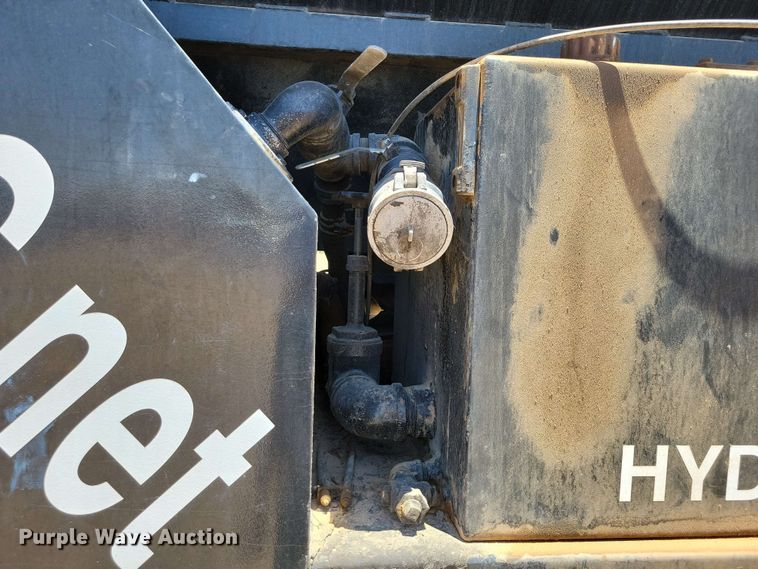 image for item DX7078 2000 Volvo WG Series asphalt slurry truck