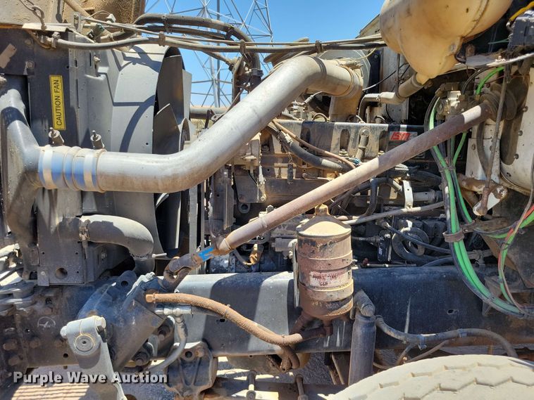 image for item DX7078 2000 Volvo WG Series asphalt slurry truck