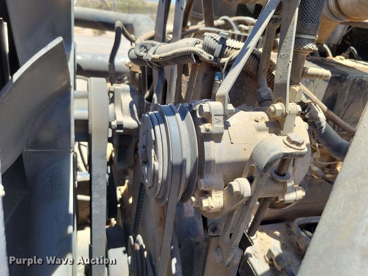 image for item DX7078 2000 Volvo WG Series asphalt slurry truck