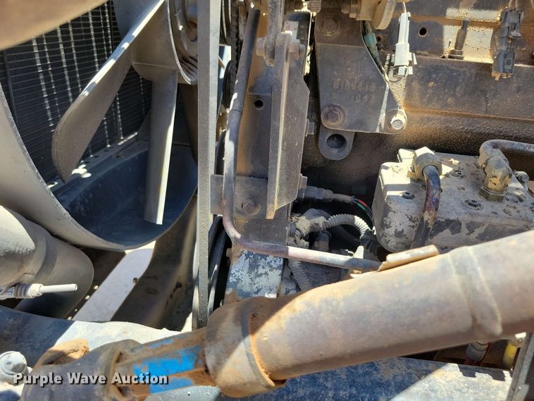 image for item DX7078 2000 Volvo WG Series asphalt slurry truck