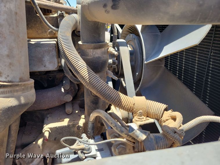 image for item DX7078 2000 Volvo WG Series asphalt slurry truck