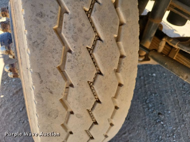 image for item DX7078 2000 Volvo WG Series asphalt slurry truck