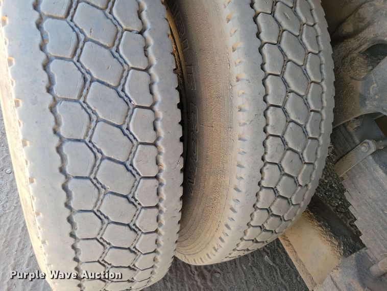 image for item DX7078 2000 Volvo WG Series asphalt slurry truck