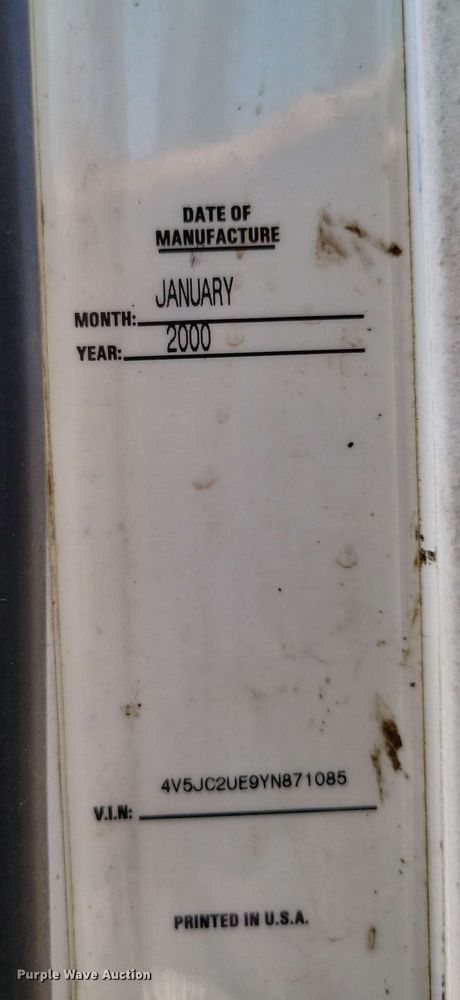 image for item DX7078 2000 Volvo WG Series asphalt slurry truck