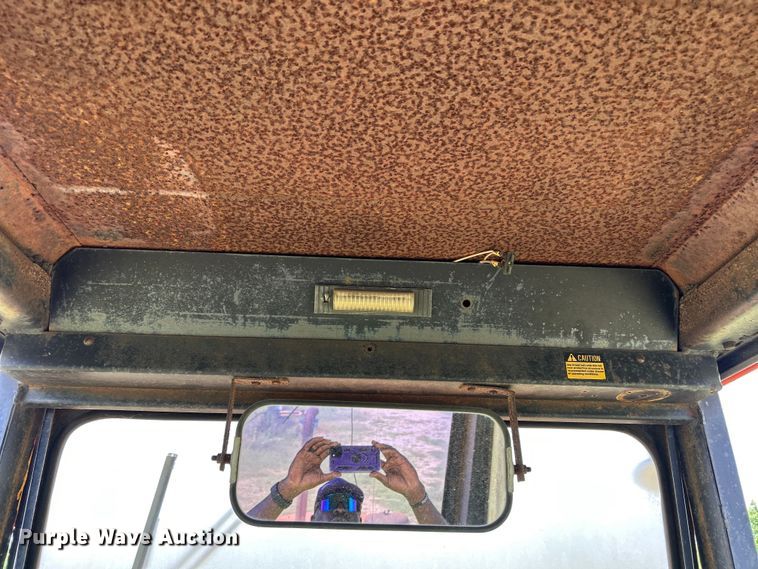 image for item EC1403 1983 John Deere 570A motor grader