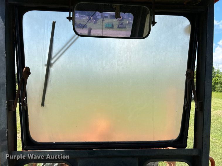 image for item EC1403 1983 John Deere 570A motor grader