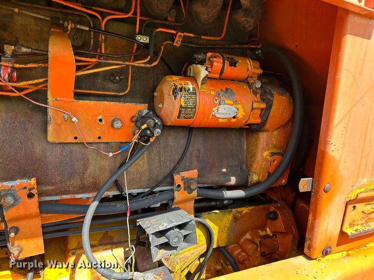 image for item EC1403 1983 John Deere 570A motor grader