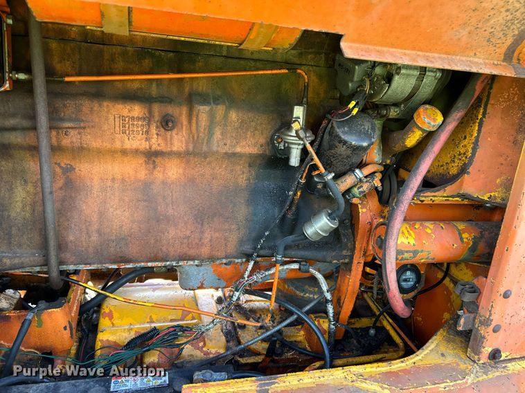 image for item EC1403 1983 John Deere 570A motor grader