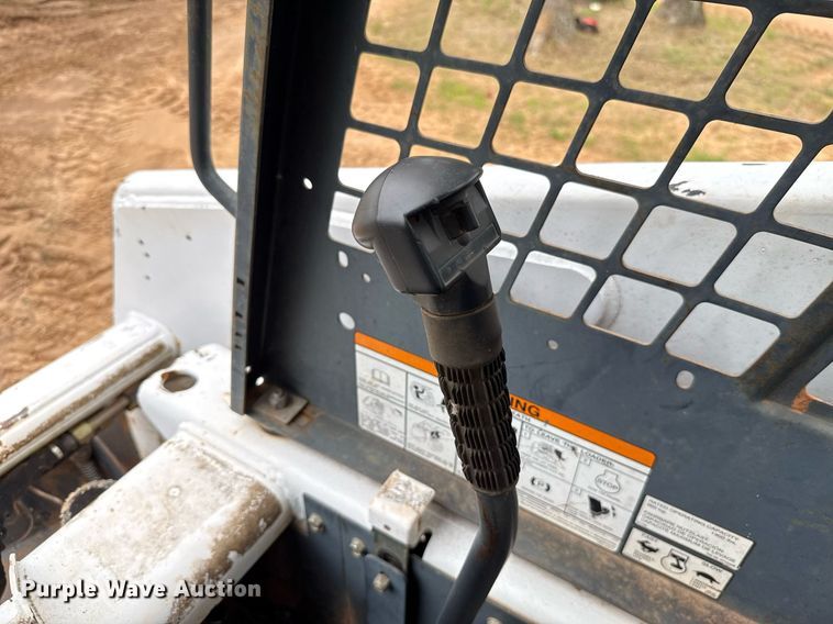 image for item EJ4705 1999 Bobcat 863 skid steer loader