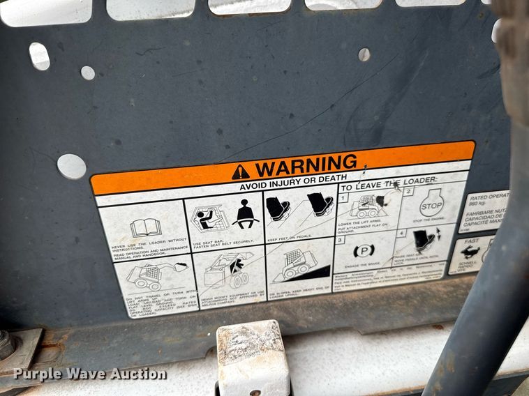 image for item EJ4705 1999 Bobcat 863 skid steer loader