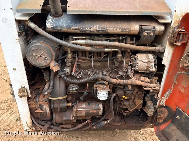 image for item EJ4705 1999 Bobcat 863 skid steer loader