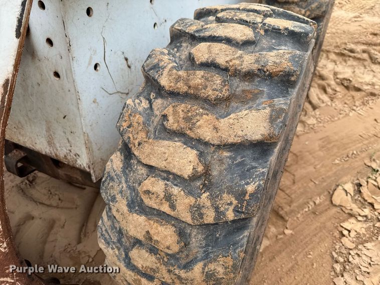 image for item EJ4705 1999 Bobcat 863 skid steer loader