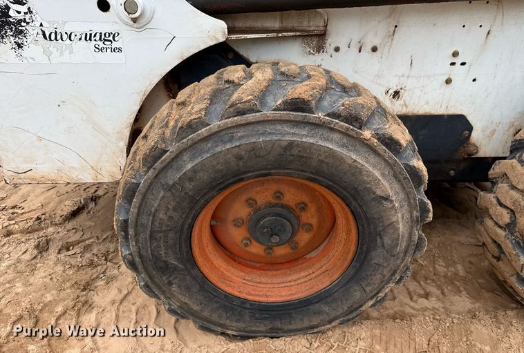 image for item EJ4705 1999 Bobcat 863 skid steer loader