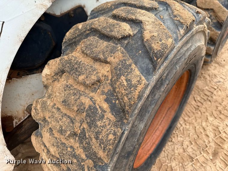 image for item EJ4705 1999 Bobcat 863 skid steer loader