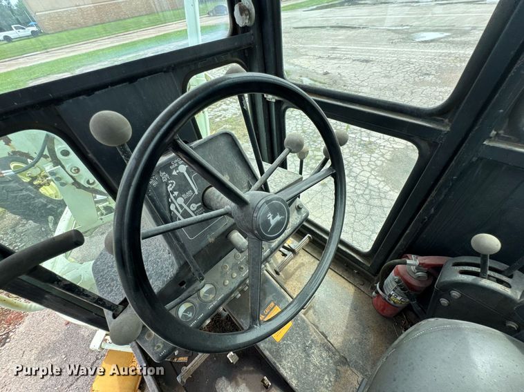 image for item DU9903 1981 John Deere JD570-A motor grader