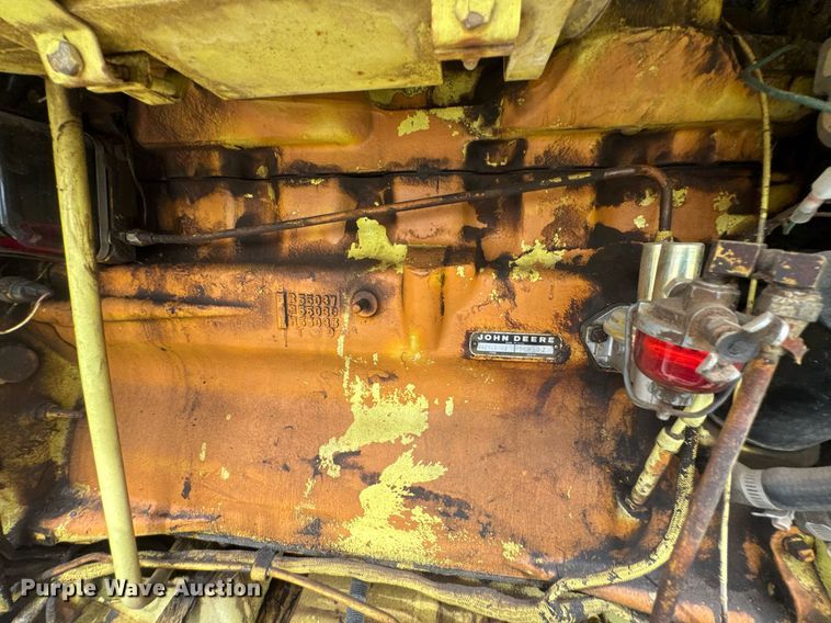 image for item DU9903 1981 John Deere JD570-A motor grader