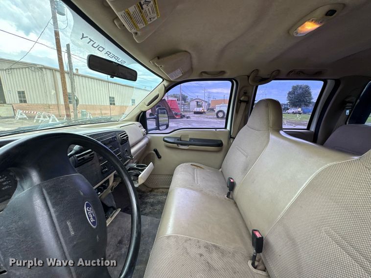 image for item DU9907 2006 Ford F450 Super Duty Crew Cab flatbed truck