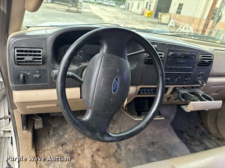 image for item DU9907 2006 Ford F450 Super Duty Crew Cab flatbed truck