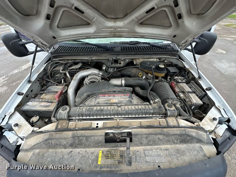 image for item DU9907 2006 Ford F450 Super Duty Crew Cab flatbed truck