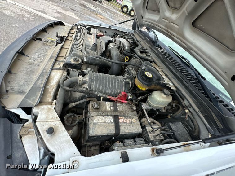 image for item DU9907 2006 Ford F450 Super Duty Crew Cab flatbed truck