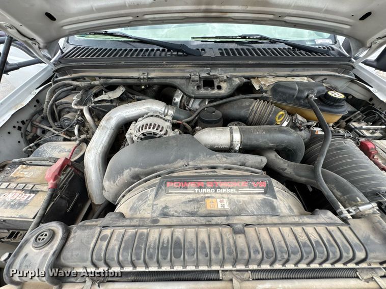 image for item DU9907 2006 Ford F450 Super Duty Crew Cab flatbed truck