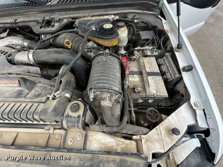 image for item DU9907 2006 Ford F450 Super Duty Crew Cab flatbed truck