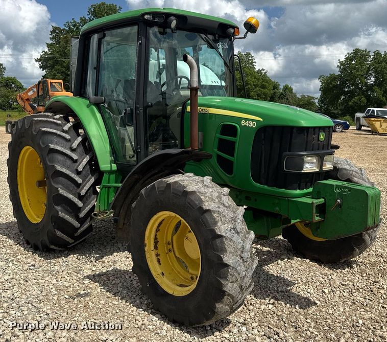 image for item DV4219 2011 John Deere 6430 MFWD tractor