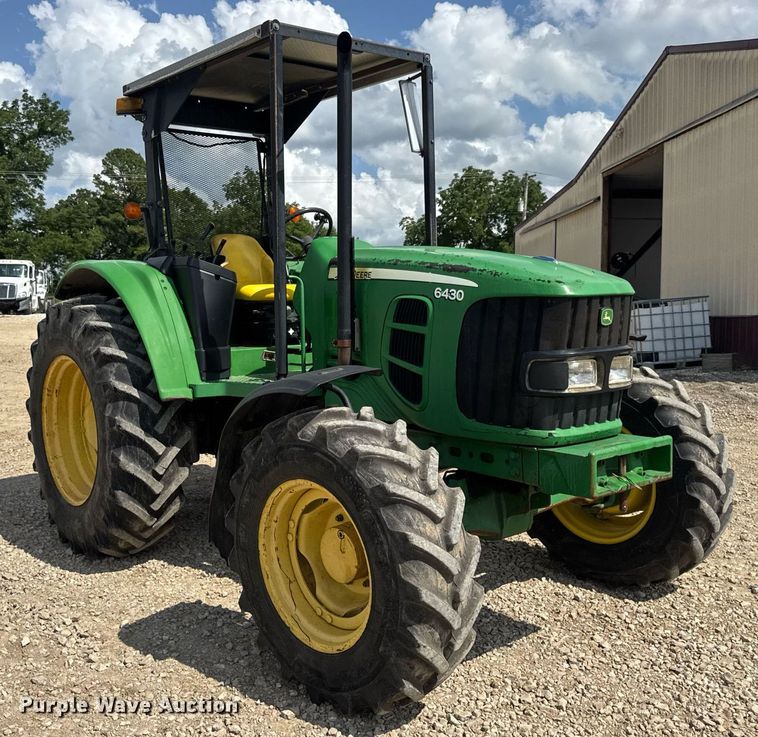 image for item DV4220 2003 John Deere 6430 MFWD tractor