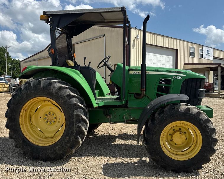 image for item DV4220 2003 John Deere 6430 MFWD tractor