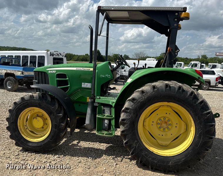 image for item DV4220 2003 John Deere 6430 MFWD tractor