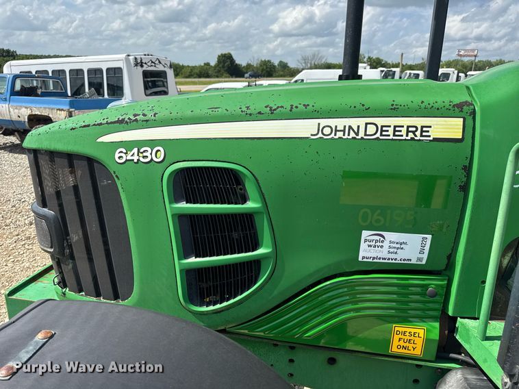 image for item DV4220 2003 John Deere 6430 MFWD tractor
