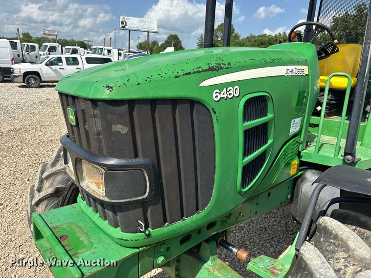 image for item DV4220 2003 John Deere 6430 MFWD tractor
