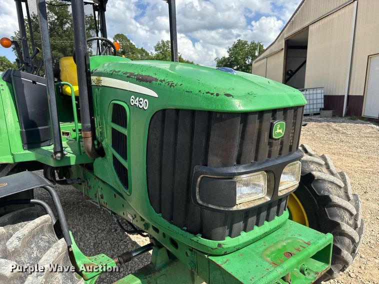 image for item DV4220 2003 John Deere 6430 MFWD tractor