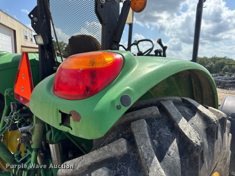 image for item DV4220 2003 John Deere 6430 MFWD tractor