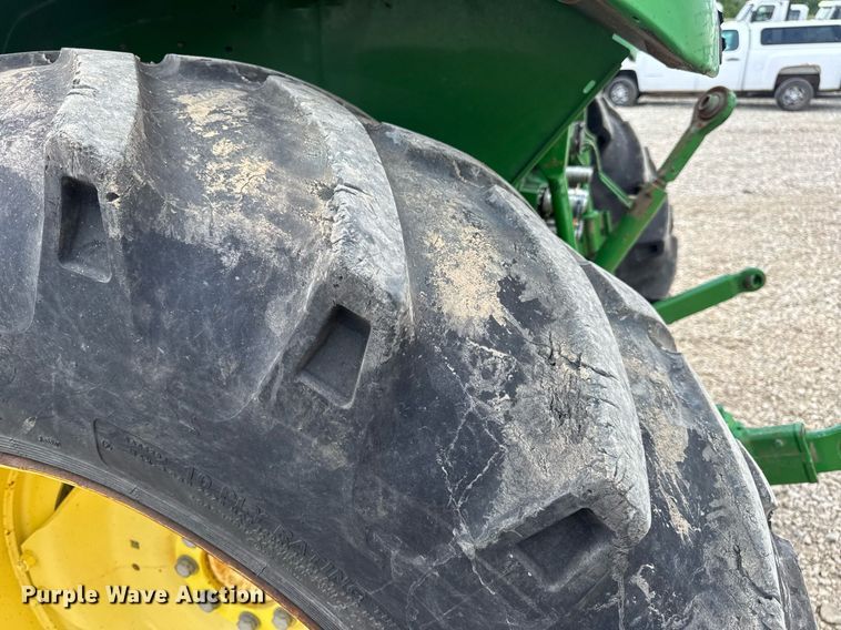 image for item DV4220 2003 John Deere 6430 MFWD tractor